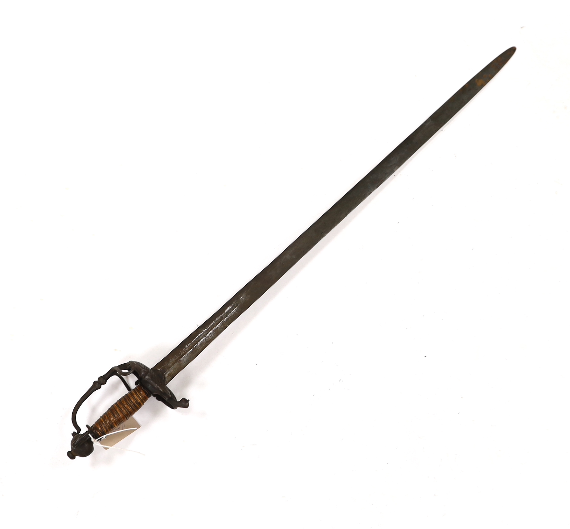 A 17th century Walloon-hilted small sword with pierced iron guard, replacement wooden grip and wide blade (possibly associated), blade 79cm